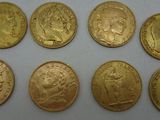 a group of six gold sovereigns