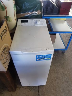 an image of a washing machine in a garage