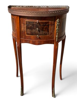 an old wooden table with a drawer on top of it