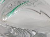 a close up view of a glass of water with a toothbrush in it