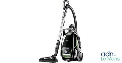 a black and white photo of a vacuum cleaner on a white background