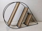 three books stacked on top of each other on a shelf
