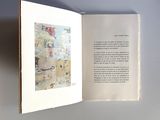an open book with a picture of a painting on it