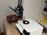 an image of a printer on a desk in a home office