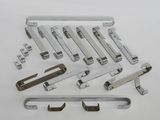 a close up of a bunch of metal parts on a white surface