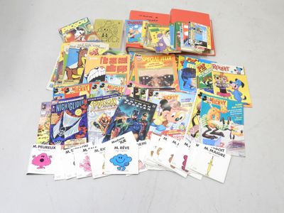 une pile de livres pour enfants par terre