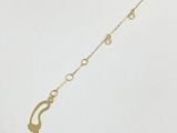 a close up of a gold necklace on a white background