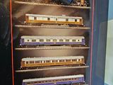 a picture of a train on display in a glass case