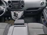 a view of the inside of a car from the driver ' s seat