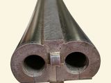 a metal tube with two holes in it