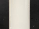 a white water heater sitting on top of a tiled floor