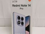 the box of the redmi note 14 pro is open on the table