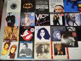 a table with a bunch of different album covers on it
