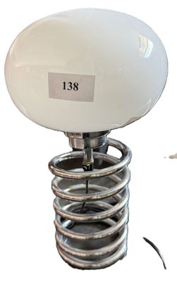 a white light that is on top of a spring