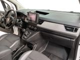 the interior of a car with a steering wheel, dashboard, and dashboard controls