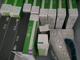 a lot of electronic devices in a plastic box