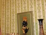 a picture of a mantle with a clock and vases on it
