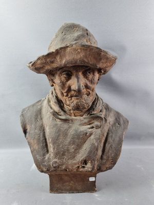 bust of a man wearing a hat and scarf with a scarf around his neck
