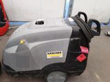 a machine that is sitting on the ground in the garage