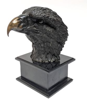 a close up of a statue of an eagle on a pedestal