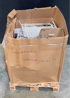 a cardboard box with a shopping cart inside of it
