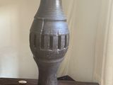 a lamp that is sitting on top of a wooden table