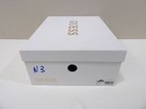 a white box with a blue and yellow logo on it