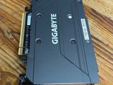 a video card sitting on top of a wooden table