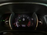 a close up of a car dashboard with a speedometer