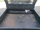 an image of a truck bed with a truck in the back