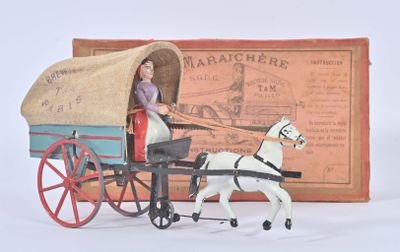 toy horse pulling a covered wagon with a woman in it