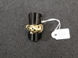 a black and gold ring with a leopard head on it