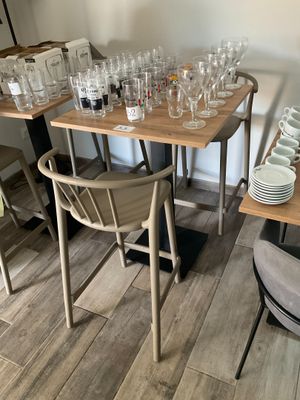 a table that has a lot of glasses on it