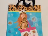 a bag that has a picture of a girl on it