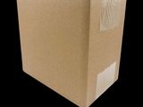 a cardboard box that is sitting on a black surface