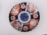 a plate with a blue and red design on it