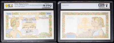 three different types of currency are on display in a display case