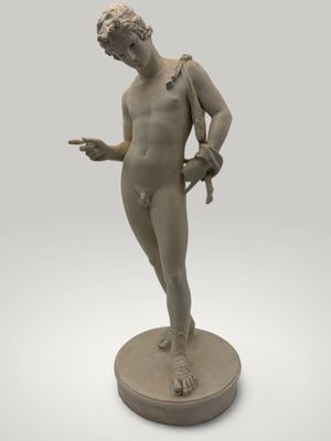 an image of a statue of a man with a knife in his hand