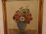 a painting on the wall of a room with a vase of flowers in it