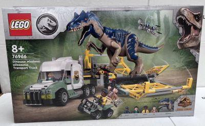 a box of legos with a dinosaur on it