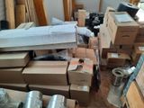 a pile of boxes that are sitting on the floor