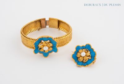 pair of gold and blue enamel flower rings and earrings