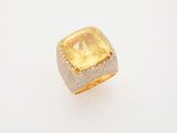 a yellow sapphire and diamond ring