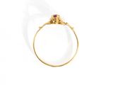 an image of a gold ring with a ruby stone in the center