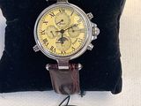 an image of a wrist watch with a yellow dial