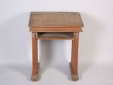 a small wooden table with a drawer underneath it