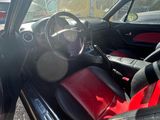 a car that has a red seat in the back of it
