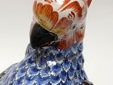 a bird that is sitting on top of a table