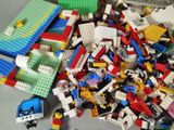 a pile of legos sitting on top of a table