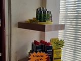 a shelf that has a lot of items on it